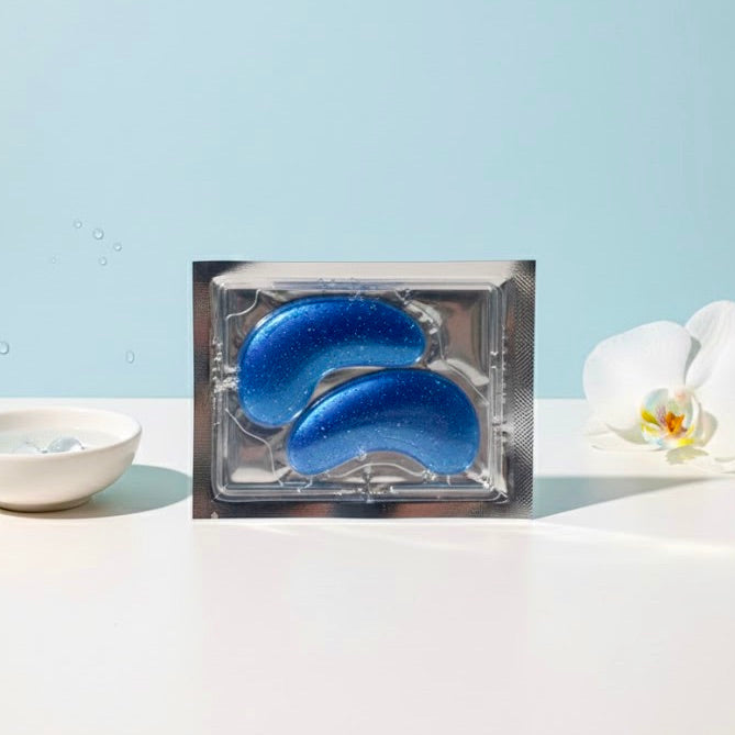 Our Sapphire Chill Eye Masks combine cooling hydrogel technology with marine vegan collagen to instantly de-puff, firm, and smooth the delicate under-eye area in just 15 minutes. Infused with dual-weight Hyaluronic Acid for a deep moisture surge, these masks leave skin plump and revitalized with a sleek, electric blue glitter finish—the ultimate high-impact accessory for your next GRWM video.
